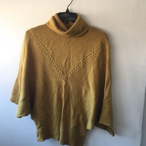 Waist Length sweater.